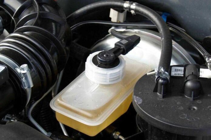 Ford Laser Overflow Bottle